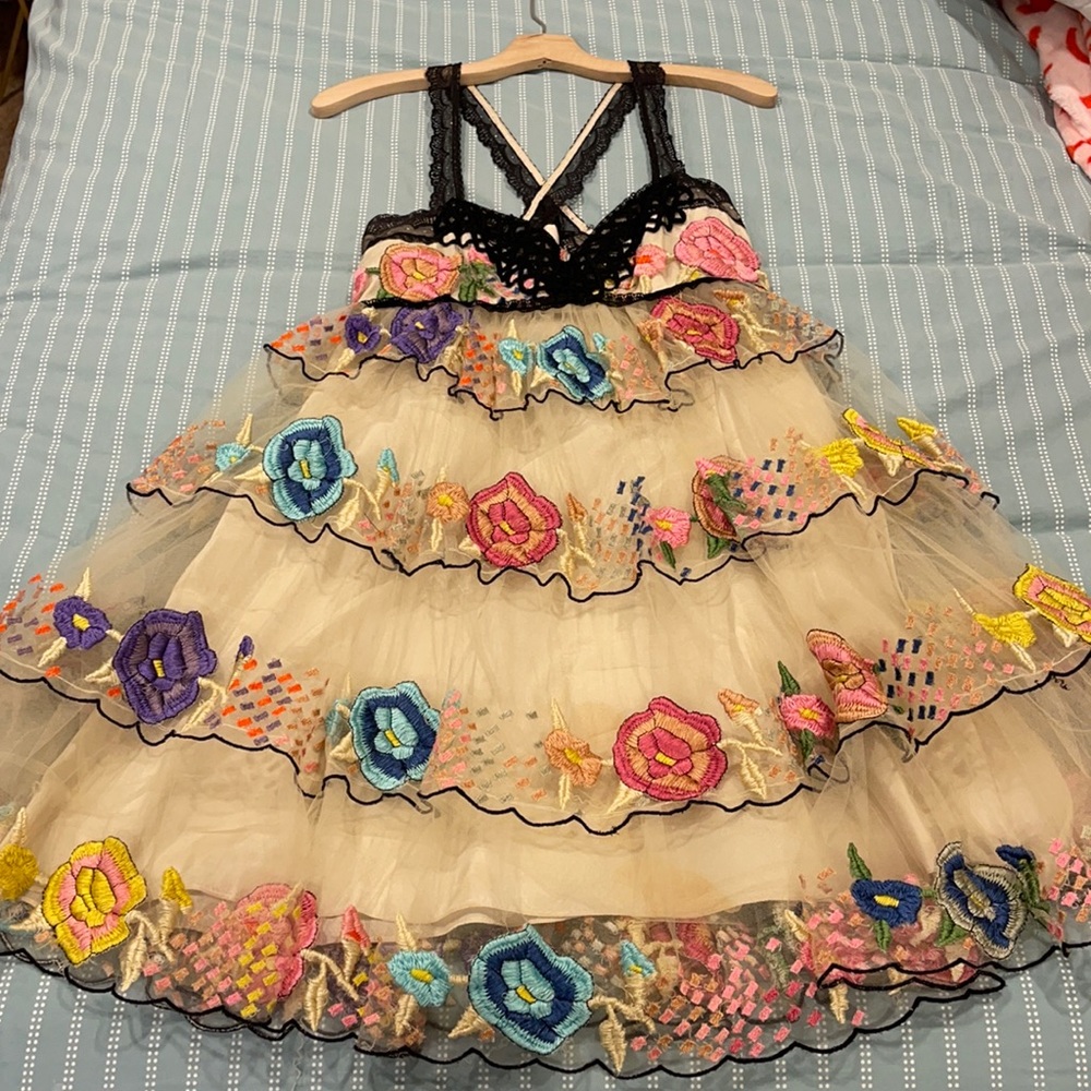 Love this summertime floral hand-stitched dress! One of my favs.